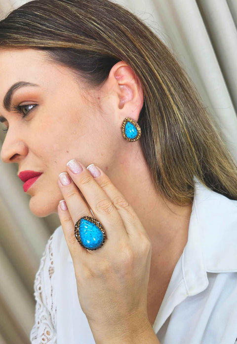Brinco Vibra com gota azul e pedras smoked banhado no vintage