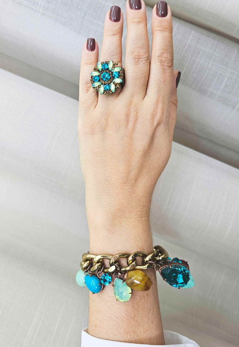 Pulseira Mocha blue com pedras azuis e marrons banhado no ouro velho