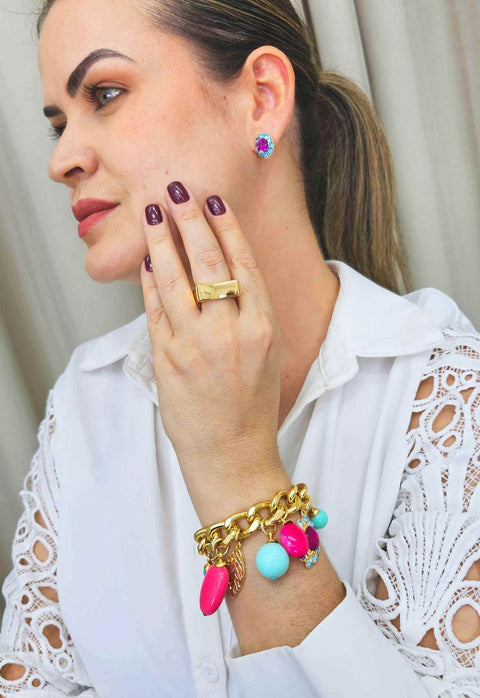 Pulseira Babalu com pingetnes rosa e azul banhado no dourado