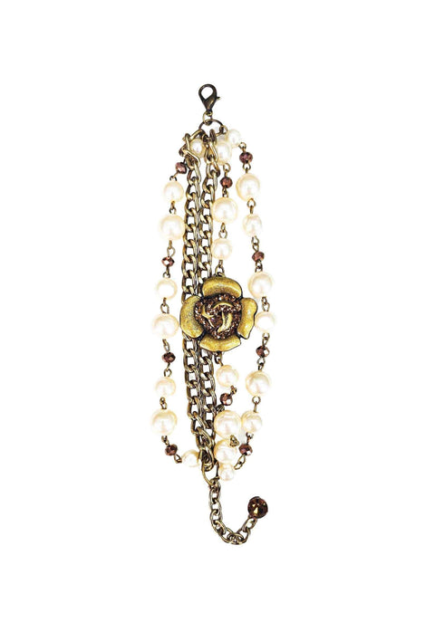 Pulseira Florbella ouro velho com perolas e pingente de flor smoked