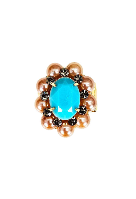 Anel Donatela luxuoso com pedra azul e black diamond banhado no dourado