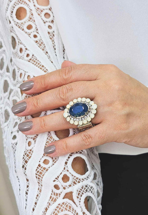 Anel Aconchegar com pedra azul e strass opal banhado no prata