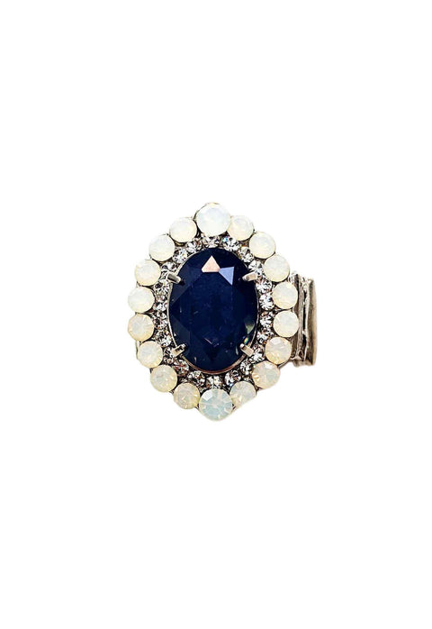 Anel Aconchegar com pedra azul e strass opal banhado no prata