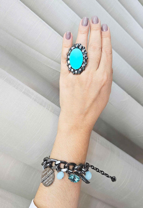 Anel Conexão oval com pedra azul e hematite banhado no grafite