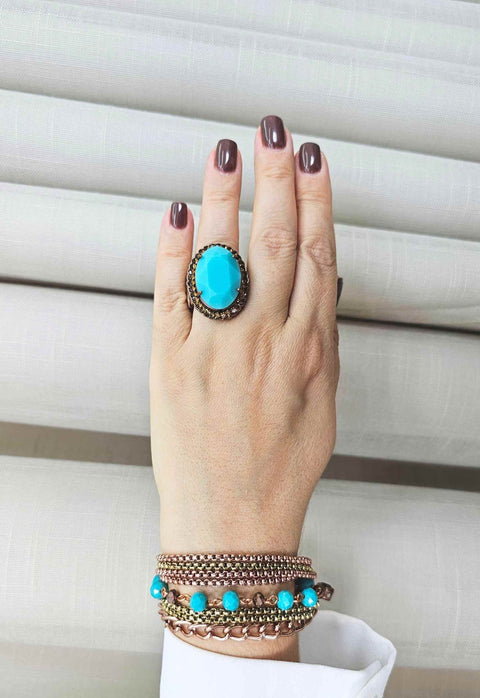 Pulseira Radiância com pedras azuis e correntes ouro velho e vintage