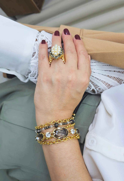 Pulseira Aurora dourada com pedras black diamond
