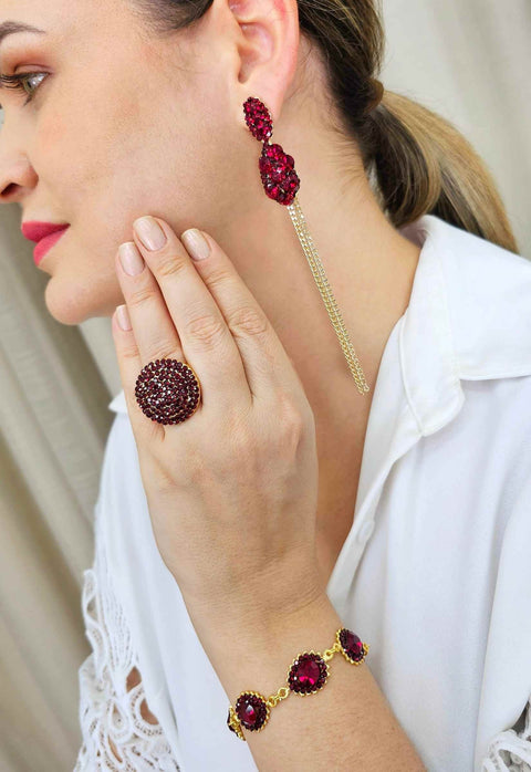 Pulseira Rubi Glam dourada com pedras vermelhas