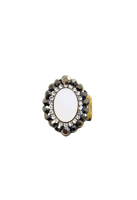 Anel Fascínio oval com pedra branca e hematite banhado no ouro velho