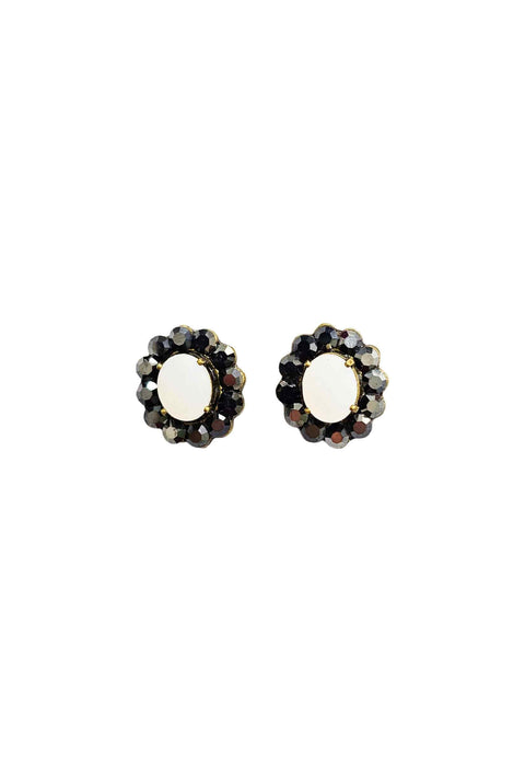 Brinco Fascínio oval com pedras brancas e hematite banhado no ouro velho