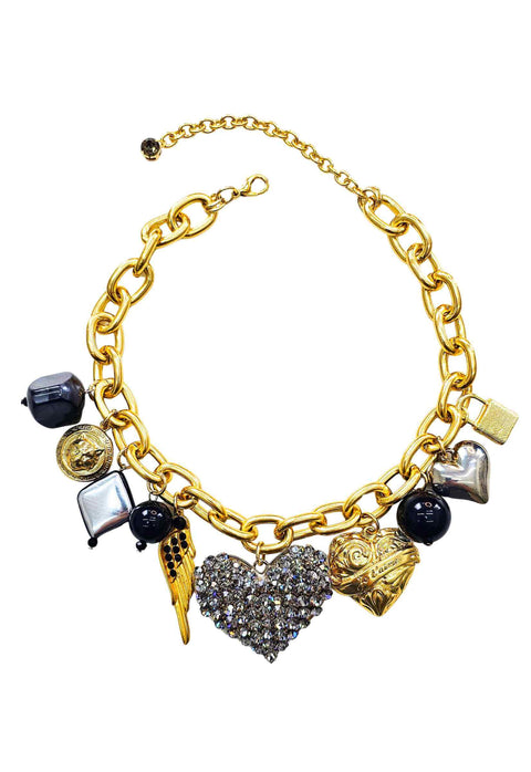 Colar Irresistível com maxi pingente de coração black diamond e pingentes de pedras pretas banhados no dourado e prata