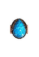 Anel Vibra com gota azul e pedras smoked banhado no vintage