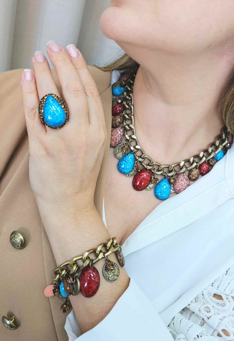 Anel Vibra com gota azul e pedras smoked banhado no vintage
