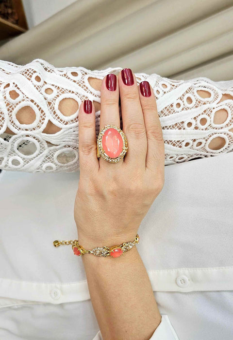Anel Ariana dourado com pedra salmão