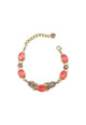 Pulseira Ariana dourada com pedras salmão