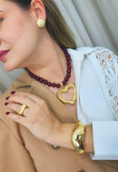 Colar Alma com pingente de coração dourado e bolas vermelhas