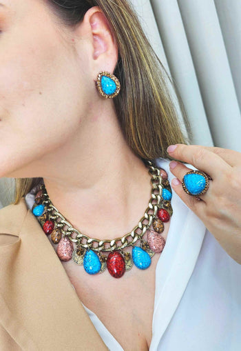 Brinco Vibra com gota azul e pedras smoked banhado no vintage