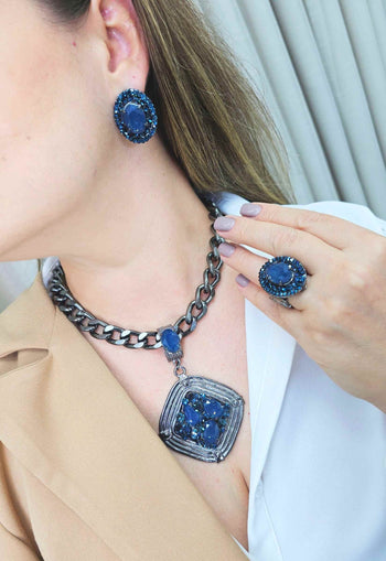 Anel Carmine Glam oval de pedras azuis banhado no onix