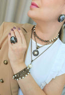 Pulseira Sucesso ouro velho com perolas e pedras black diamond