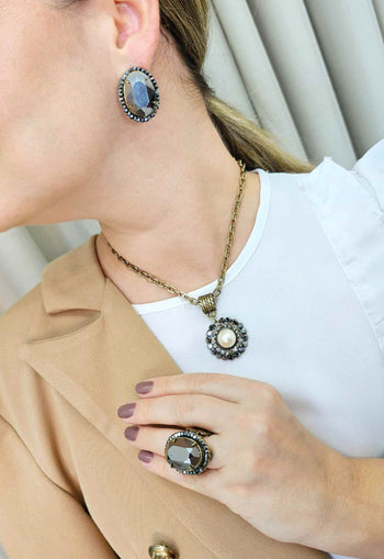 Brinco Sucesso ouro velho oval com pedras hematite