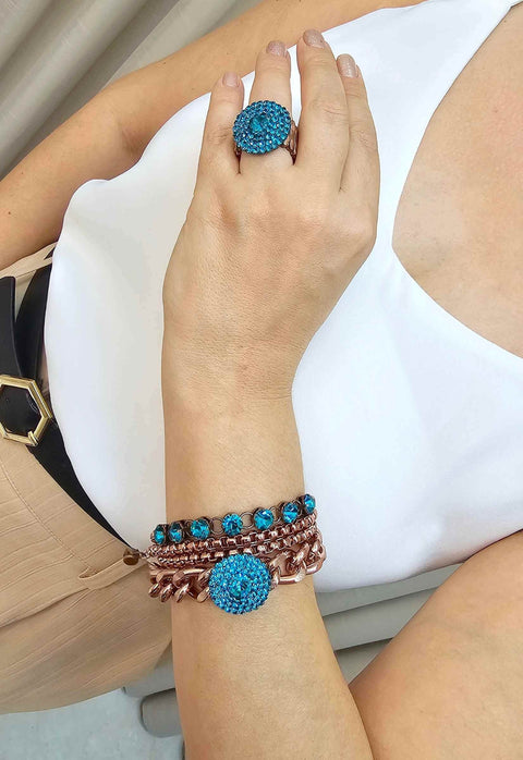 Anel Atalia redondo com pedras blue zircon
