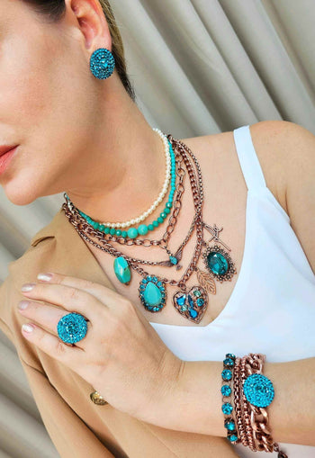 Brinco Atalia redondo com pedras blue zircon