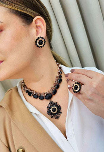 Brinco Gerusa com pedras pretas e light peach