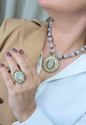 Anel Solene cinza e opal banhado no dourado