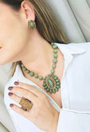 Brinco Verde Encanto com pedras verdes banhado no vintage