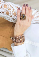 Anel Momentos mocha com pedras marrons banhado no vintage