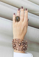 Anel Momentos mocha com pedras marrons banhado no vintage
