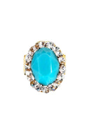 Anel Julieta dourado com pedra oval azul e strass cristal