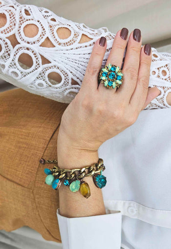 Pulseira Mocha blue com pedras azuis e marrons banhado no ouro velho