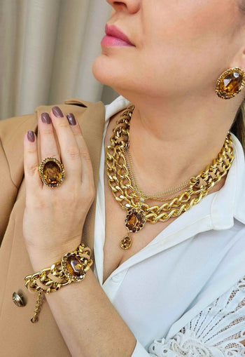 Brinco Helena gold com pedras douradas