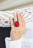 Anel Sucesso ouro velho oval com pedras vermelhas