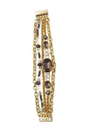 Pulseira Aurora dourada com pedras black diamond