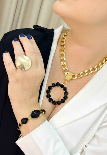 Pulseira Raika black banhada no dourado
