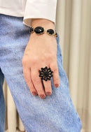 Pulseira Raika black banhada no dourado
