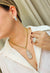 Colar Alure de gota furta cor banhado no dourado