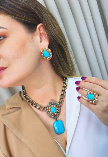 Anel Donatela luxuoso com pedra azul e black diamond banhado no dourado