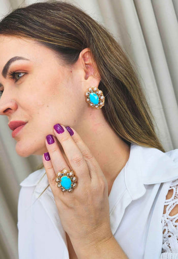 Anel Donatela luxuoso com pedra azul e black diamond banhado no dourado