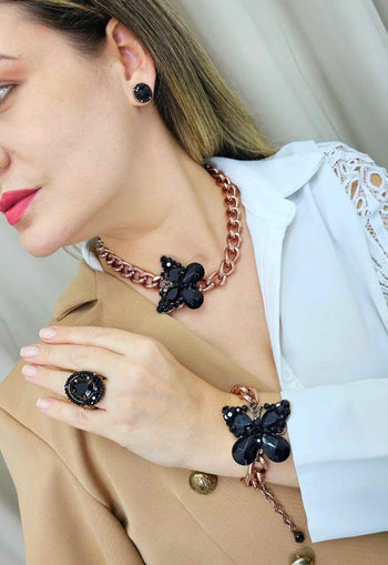 Pulseira Empoderada com pingente de borboleta preta e elos vintge