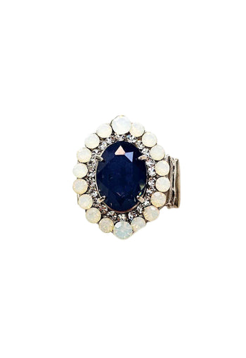 Anel Aconchegar com pedra azul e strass opal banhado no prata