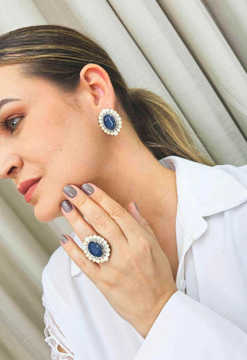 Anel Aconchegar com pedra azul e strass opal banhado no prata