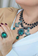 Anel oval Heloara onix com pedra verde e hematite