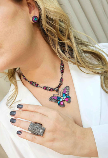 Brinco Prestigio pequeno com pedras fucsias hematite e blue zircon