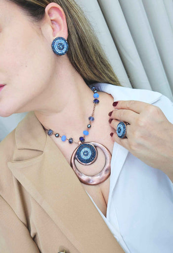 Brinco Salina redondo com pedras azuis banhado no vintage