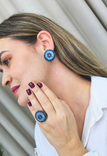 Anel Salina redondo com pedras azuis banhado no vintage