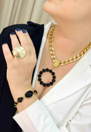 Maxi colar Raika Black com pingente preto e banho dourado
