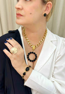 Maxi colar Raika Black com pingente preto e banho dourado