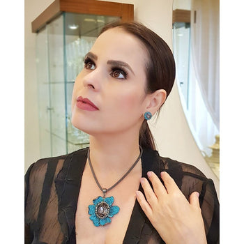 Brinco ponto de luz azul com pedra black diamond